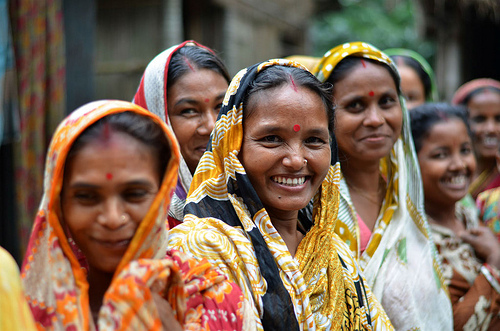 Women farmers gathering during morning milk collection session in Bangladesh